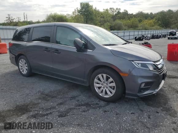 2018 Honda Odyssey LX with VIN 5FNRL6H29JB043696, listed as a Copart auction lot 80569835 with 29,515 mi miles and Salvage title. Bid and sale history available at DreamBid. Image 4.