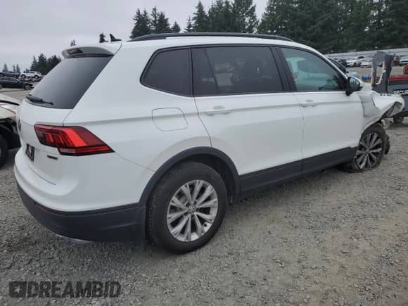 2020 Volkswagen Tiguan S с VIN 3VV0B7AX9LM019938, выставлен на аукционе Copart как лот 80056555 с пробегом 96 506 миль миль и Списание • Salvage title. История ставок и продаж доступна на DreamBid. Изображение 3.