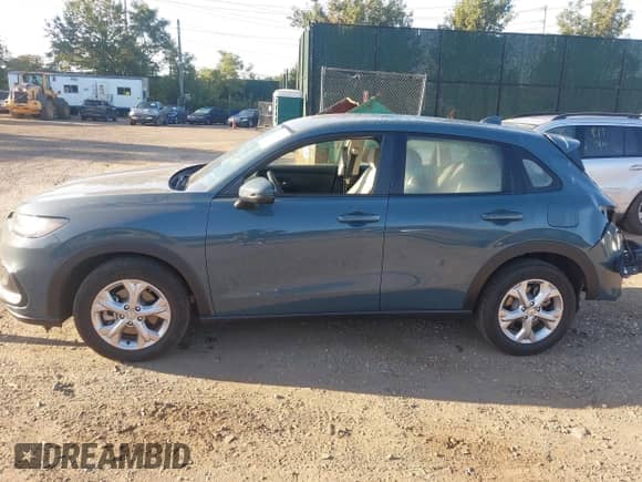 2025 Honda HR-V LX with VIN 3CZRZ2H31SM719873, listed as a IAAI auction lot 43132417 with 5,747 mi miles and . Bid and sale history available at DreamBid. Image 14.
