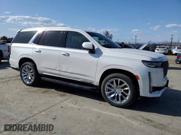 2022 Cadillac Escalade Premium Luxury с VIN 1GYS4BKL6NR153415, выставлен на аукционе Copart как лот 52036525 с пробегом 70 148 миль миль и Списание • Salvage title. История ставок и продаж доступна на DreamBid. Изображение 4.