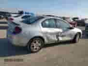 2001 Dodge Neon Highline with VIN 1B3ES46C61D101306, listed as a Copart auction lot 71385204 with 187,841 mi miles and Salvage title. Bid and sale history available at DreamBid. Image 3.
