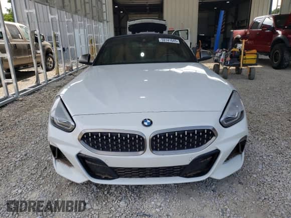 2020 BMW Z4 sDriveM40i z VIN WBAHF9C02LWW41974, wystawiony jako Copart lot #59141645 z przebiegiem Nie podano mil oraz Szkoda całkowita • Salvage title. Historia ofert i sprzedaży dostępna na DreamBid. Obrazek 5.
