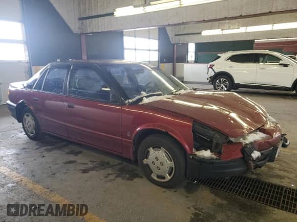 1995 Saturn SL с VIN 1G8ZH5284SZ188708, выставлен на аукционе Copart как лот 85942884 с пробегом 151 918 миль миль и Списание • Salvage title. История ставок и продаж доступна на DreamBid. Изображение 4.
