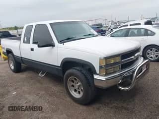 1996 Chevrolet Silverado 1500 z VIN 1GCEK19M4TE120483, wystawiony jako IAAI lot #42623199 z przebiegiem 154 864 mil mil oraz . Historia ofert i sprzedaży dostępna na DreamBid. Obrazek 1.
