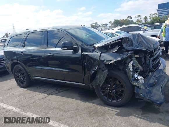 2014 Dodge Durango R/T with VIN 1C4SDHCT5EC972488, listed as a IAAI auction lot 42809702 with 179,360 mi miles and . Bid and sale history available at DreamBid. Image 13.