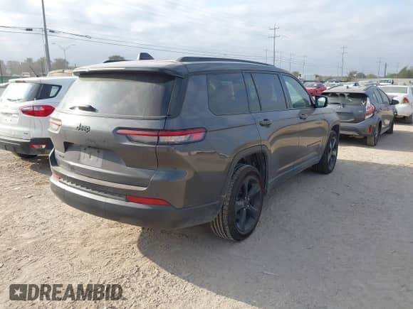 2023 Jeep Grand Cherokee Altitude with VIN 1C4RJKAG5P8884850, listed as a IAAI auction lot 43514513 with 71,482 mi miles and . Bid and sale history available at DreamBid. Image 4.