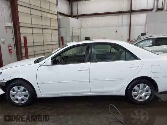 2002 Toyota Camry LE с VIN 4T1BE32K02U077095, выставлен на аукционе IAAI как лот 42405814 с пробегом 312 692 миль миль и . История ставок и продаж доступна на DreamBid. Изображение 14.