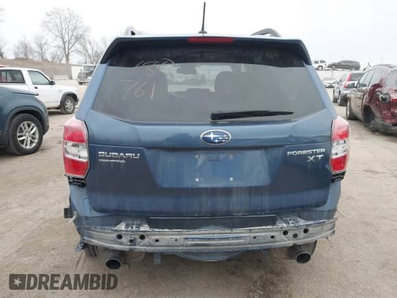 2014 Subaru Forester XT Touring z VIN JF2SJGMC9EH428341, wystawiony jako IAAI lot #41185804 z przebiegiem 111 000 mil mil oraz . Historia ofert i sprzedaży dostępna na DreamBid. Obrazek 16.