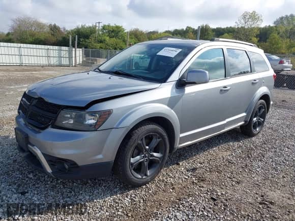 2018 Dodge Journey Crossroad with VIN 3C4PDCGB2JT257385, listed as a IAAI auction lot 43310096 with 143,539 mi miles and . Bid and sale history available at DreamBid. Image 2.