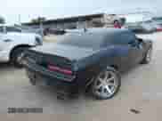 2021 Dodge Challenger R/T Scat Pack with VIN 2C3CDZFJ7MH637589, listed as a IAAI auction lot 43029784 with 30,160 mi miles and . Bid and sale history available at DreamBid. Image 4.