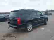 2014 Chevrolet Tahoe LTZ z VIN 1GNSKCE0XER233116, wystawiony jako IAAI lot #41994763 z przebiegiem 160 731 mil mil oraz . Historia ofert i sprzedaży dostępna na DreamBid. Obrazek 4.