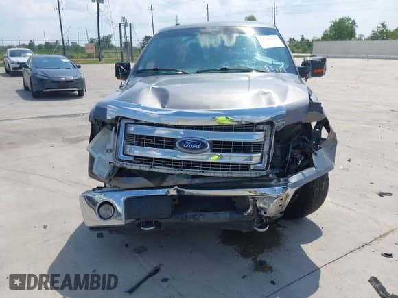2013 Ford F-150 XL with VIN 1FTFW1EF3DKF36298, listed as a IAAI auction lot 43230999 with 221,461 mi miles and . Bid and sale history available at DreamBid. Image 12.