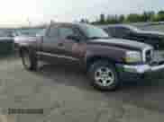 2005 Dodge Dakota SLT with VIN 1D7HW42K75S305973, listed as a Copart auction lot 58300615 with 179,658 mi miles and Salvage title. Bid and sale history available at DreamBid. Image 4.
