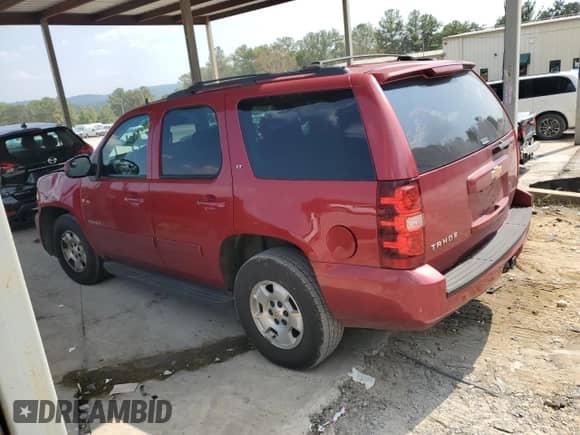 2013 Chevrolet Tahoe LT with VIN 1GNSCBE06DR218778, listed as a Copart auction lot 81143225 with 199,113 mi miles and Salvage title. Bid and sale history available at DreamBid. Image 2.