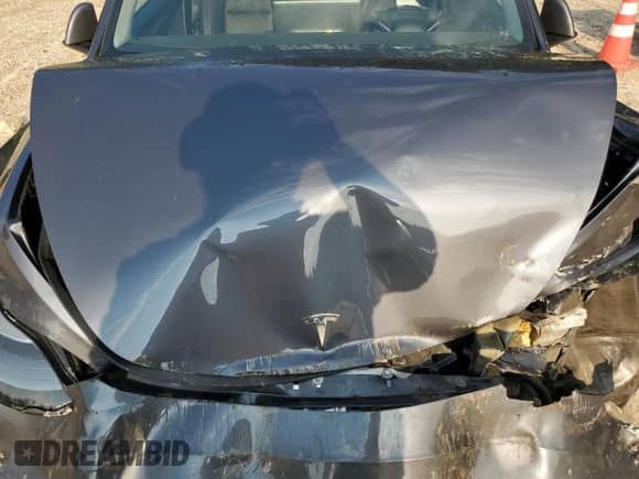 2023 Tesla Model Y Long Range with VIN 7SAYGAEE4PF668889, listed as a Copart auction lot 67239314 with 26,874 mi miles and Salvage title. Bid and sale history available at DreamBid. Image 12.