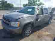 2007 Chevrolet Suburban LS with VIN 1GNFC16J77R260500, listed as a IAAI auction lot 42787990 with 167,163 mi miles and . Bid and sale history available at DreamBid. Image 2.