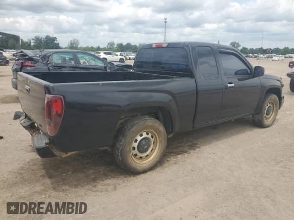 2012 Chevrolet Colorado Work Truck with VIN 1GCESBFE0C8162070, listed as a Copart auction lot 55124445 with 114,965 mi miles and Salvage title. Bid and sale history available at DreamBid. Image 3.
