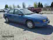 2001 Saturn SL with VIN 1G8ZK547X1Z294553, listed as a Copart auction lot 53786805 with 288,011 mi miles and Salvage title. Bid and sale history available at DreamBid. Image 4.