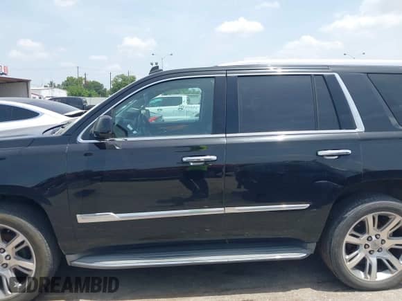 2015 Cadillac Escalade Luxury with VIN 1GYS3BKJ6FR187602, listed as a IAAI auction lot 42648552 with 164,759 mi miles and . Bid and sale history available at DreamBid. Image 14.