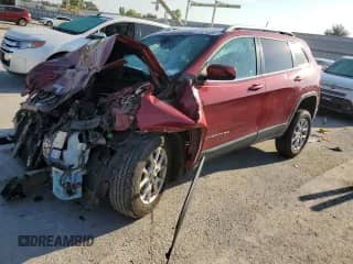 2014 Jeep Cherokee Latitude с VIN 1C4PJMCB4EW198361, выставлен на аукционе Copart как лот 71474555 с пробегом 134 717 миль миль и Списание • Salvage title. История ставок и продаж доступна на DreamBid. Изображение 1.