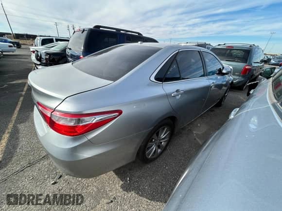 2015 Toyota Camry LE с VIN 4T1BD1FK4FU160911, выставлен на аукционе Copart как лот 71867615 с пробегом 339 207 миль миль и Списание • Salvage title. История ставок и продаж доступна на DreamBid. Изображение 3.