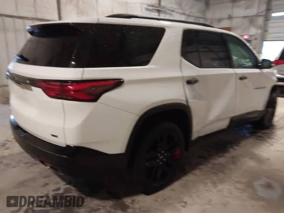 2023 Chevrolet Traverse Premier with VIN 1GNEVKKW4PJ133747, listed as a IAAI auction lot 41931340 with 29,216 mi miles and . Bid and sale history available at DreamBid. Image 4.