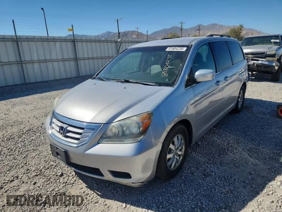 2010 Honda Odyssey EX с VIN 5FNRL3H48AB095501, выставлен на аукционе Copart как лот 81804235 с пробегом 166 003 миль миль и Списание • Salvage title. История ставок и продаж доступна на DreamBid. Изображение 1.