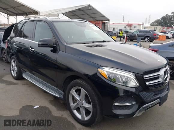 2017 Mercedes-Benz GLE 350 with VIN 4JGDA5JB4HA843261, listed as a IAAI auction lot 43363177 with 128,774 mi miles and . Bid and sale history available at DreamBid. Image 1.
