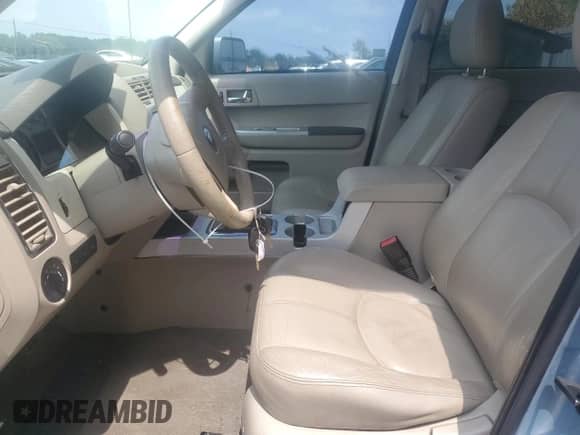 2008 Mercury Mariner Premier with VIN 4M2CU97138KJ12158, listed as a Copart auction lot 67723145 with 132,629 mi miles and Salvage title. Bid and sale history available at DreamBid. Image 7.