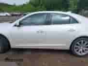 2015 Chevrolet Malibu LTZ with VIN 1G11F5SL0FF220857, listed as a IAAI auction lot 42107647 with 143,330 mi miles and . Bid and sale history available at DreamBid. Image 14.