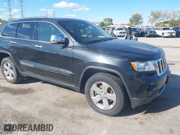 2013 Jeep Grand Cherokee Limited z VIN 1C4RJFBG4DC541915, wystawiony jako IAAI lot #43533562 z przebiegiem 164 436 mil mil oraz . Historia ofert i sprzedaży dostępna na DreamBid. Obrazek 1.