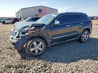 2011 Jeep Grand Cherokee Limited z VIN 1J4RR5GT3BC603692, wystawiony jako Copart lot #80214275 z przebiegiem Nie podano mil oraz Szkoda całkowita • Salvage title. Historia ofert i sprzedaży dostępna na DreamBid. Obrazek 1.
