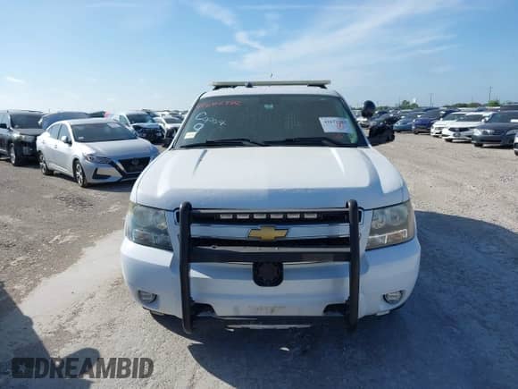 2014 Chevrolet Tahoe Commercial z VIN 1GNLC2E06ER193189, wystawiony jako IAAI lot #42672382 z przebiegiem 78 402 mil mil oraz . Historia ofert i sprzedaży dostępna na DreamBid. Obrazek 12.