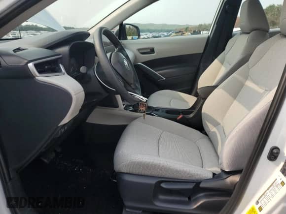 2024 Toyota Corolla Cross L with VIN 7MUAAABGXRV112077, listed as a Copart auction lot 67723795 with 13,365 mi miles and Salvage title. Bid and sale history available at DreamBid. Image 7.