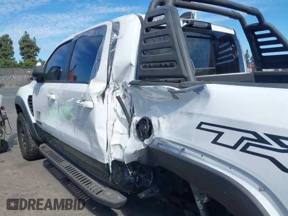 2021 Ram 1500 TRX with VIN 1C6SRFU9XMN905260, listed as a IAAI auction lot 41745910 with 69,565 mi miles and . Bid and sale history available at DreamBid. Image 17.