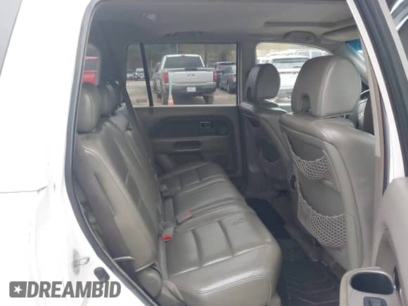 2006 Honda Pilot EX-L z VIN 2HKYF18596H515811, wystawiony jako IAAI lot #43464217 z przebiegiem 221 129 mil mil oraz . Historia ofert i sprzedaży dostępna na DreamBid. Obrazek 8.