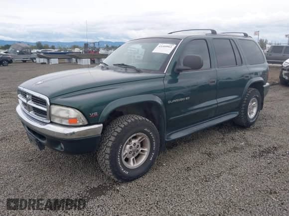 2000 Dodge Durango with VIN 1B4HS28Z4YF164191, listed as a IAAI auction lot 43409961 with 218,695 mi miles and . Bid and sale history available at DreamBid. Image 2.