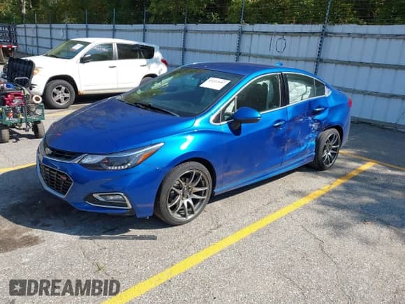 2017 Chevrolet Cruze Premier z VIN 1G1BF5SM8H7117311, wystawiony jako IAAI lot #43222687 z przebiegiem 142 852 mil mil oraz . Historia ofert i sprzedaży dostępna na DreamBid. Obrazek 17.