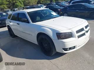 2008 Dodge Magnum SXT with VIN 2D4FV37V68H214404, listed as a IAAI auction lot 43391260 with 262,069 mi miles and . Bid and sale history available at DreamBid. Image 1.