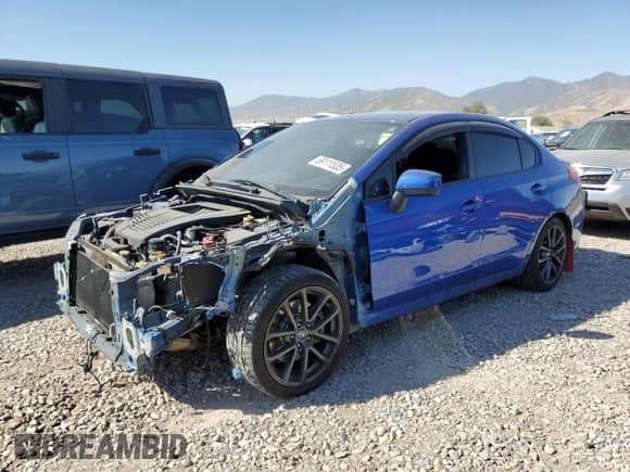2018 Subaru WRX Premium z VIN JF1VA1C69J9839625, wystawiony jako Copart lot #69111535 z przebiegiem 101 864 mil mil oraz Szkoda całkowita • Salvage title. Historia ofert i sprzedaży dostępna na DreamBid. Obrazek 1.