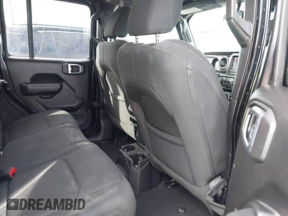 2022 Jeep Wrangler Unlimited Sport S z VIN 1C4HJXDG0NW102631, wystawiony jako IAAI lot #41870893 z przebiegiem 43 968 mil mil oraz . Historia ofert i sprzedaży dostępna na DreamBid. Obrazek 8.