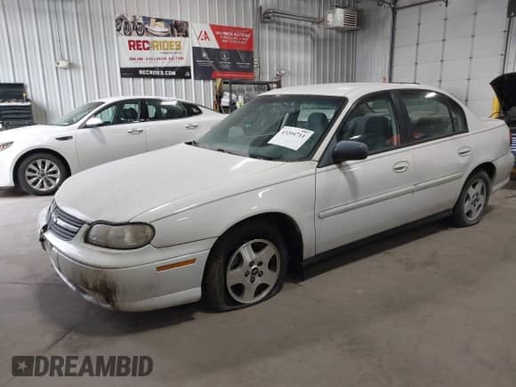 2004 Chevrolet Malibu Classic z VIN 1G1ND52F94M612231, wystawiony jako IAAI lot #43204711 z przebiegiem 128 254 mil mil oraz . Historia ofert i sprzedaży dostępna na DreamBid. Obrazek 2.