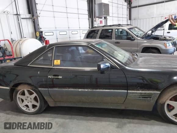 1992 Mercedes-Benz 500 z VIN WDBFA66E7NF043220, wystawiony jako IAAI lot #42744207 z przebiegiem Nie podano mil oraz . Historia ofert i sprzedaży dostępna na DreamBid. Obrazek 13.