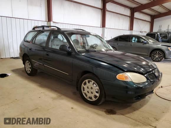 2000 Hyundai Elantra с VIN KMHJW35F3YU183816, выставлен на аукционе Copart как лот 45562725 с пробегом 12 773 миль миль и Списание • Salvage title. История ставок и продаж доступна на DreamBid. Изображение 4.