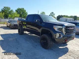 2020 GMC Sierra 1500 AT4 z VIN 1GTP9EEL2LZ207493, wystawiony jako IAAI lot #42103104 z przebiegiem 61 814 mil mil oraz . Historia ofert i sprzedaży dostępna na DreamBid. Obrazek 1.