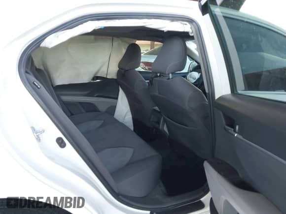 2023 Toyota Camry LE z VIN 4T1R11AK2PU138860, wystawiony jako IAAI lot #43374519 z przebiegiem 56 208 mil mil oraz . Historia ofert i sprzedaży dostępna na DreamBid. Obrazek 8.