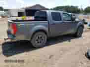 2016 Nissan Frontier Desert Runner with VIN 1N6AD0ER8GN792909, listed as a Copart auction lot 69544525 with 197,095 mi miles and Salvage title. Bid and sale history available at DreamBid. Image 3.