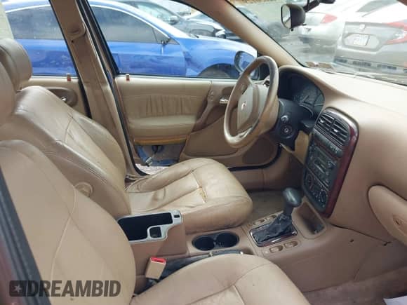 2002 Saturn LS with VIN 1G8JW54R12Y570595, listed as a IAAI auction lot 42850129 with 143,585 mi miles and . Bid and sale history available at DreamBid. Image 5.