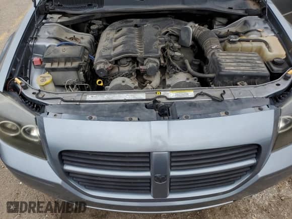 2007 Dodge Magnum with VIN 2D4FV47V67H744408, listed as a Copart auction lot 70767215 with 156,584 mi miles and Salvage title. Bid and sale history available at DreamBid. Image 11.