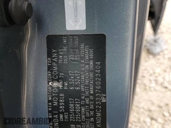 2007 Hyundai Entourage GLS with VIN KNDMC233376023404, listed as a Copart auction lot 69413625 with 135,989 mi miles and Salvage title. Bid and sale history available at DreamBid. Image 13.